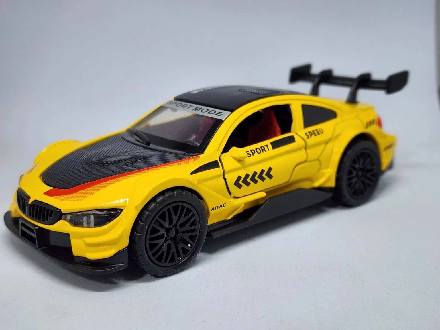 the Shiny Mart Metal Toy Sports Racing 1:36 Scale Pull-Back Action Openable Doors Toy CAR (Yellow, Pack of: 1)