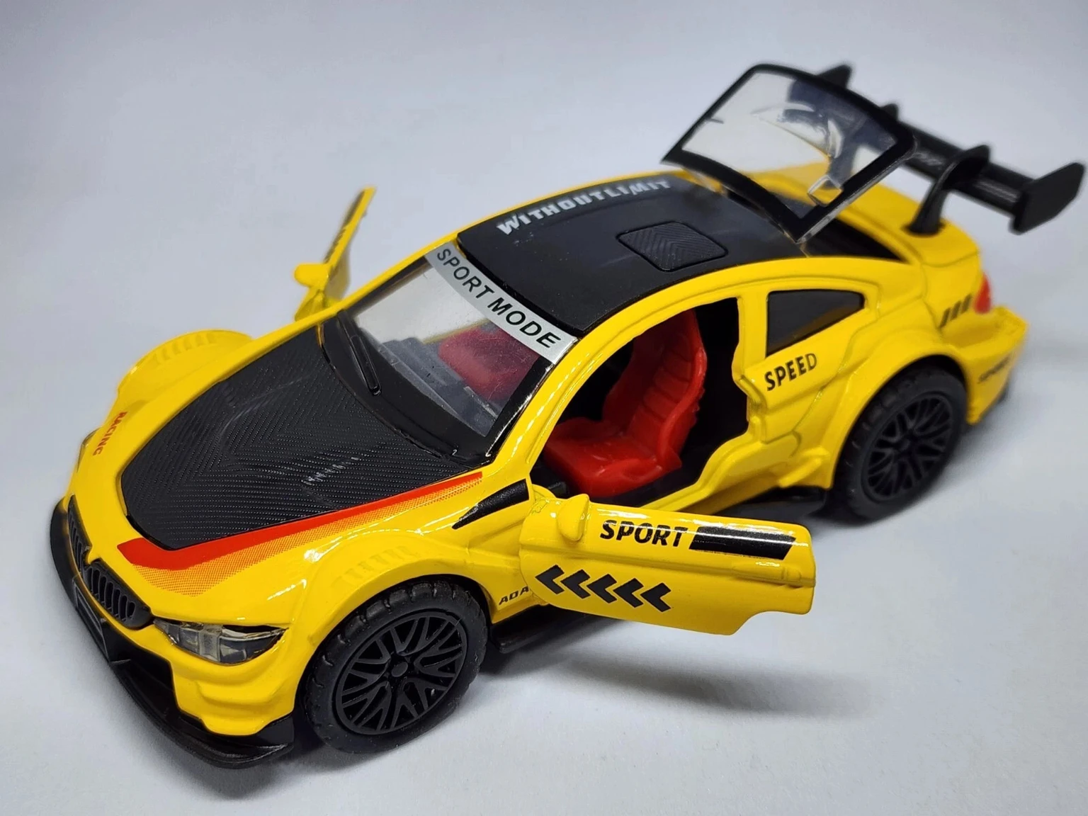 the Shiny Mart Metal Toy Sports Racing 1:36 Scale Pull-Back Action Openable Doors Toy CAR (Yellow, Pack of: 1)